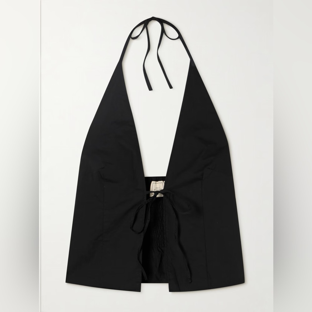 Deiji Studios’ TIE-DETAILED SMOCKED ORGANIC COTTON HALTERNECK TOP IN BLACK